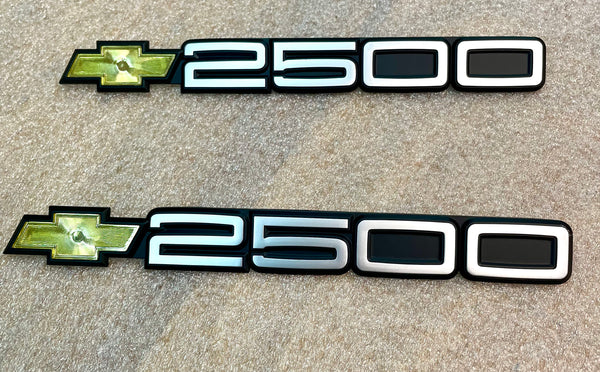 Chevrolet 2500 Silver door emblems with buckles