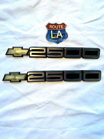 Chevrolet 2500 Silver door emblems with buckles