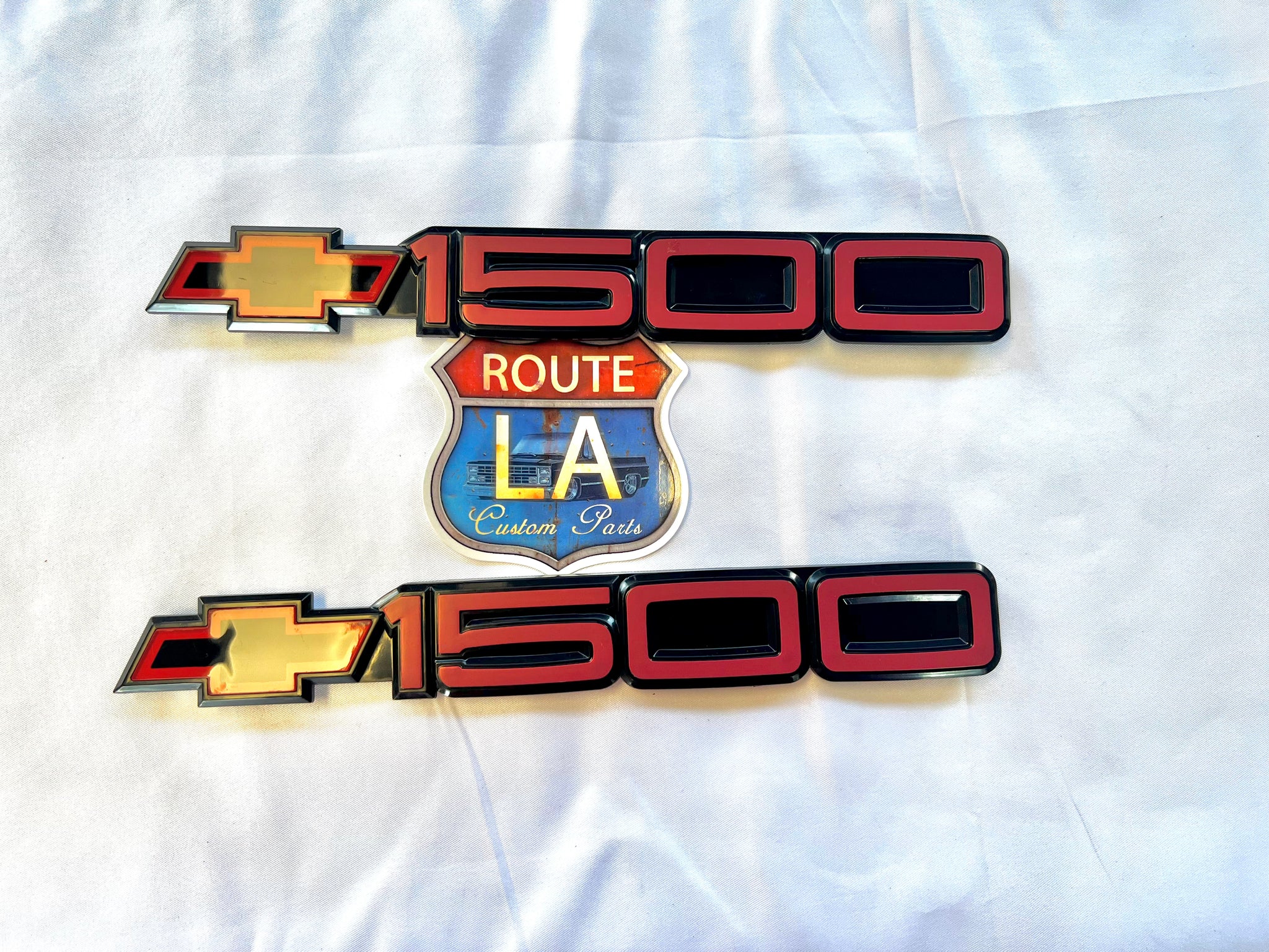 RED Chevrolet 1500 door emblem with buckles
